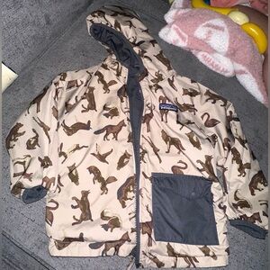 Patagonia Baby Reversible Puff-Ball Jacket featuring a "Woodland" animal print